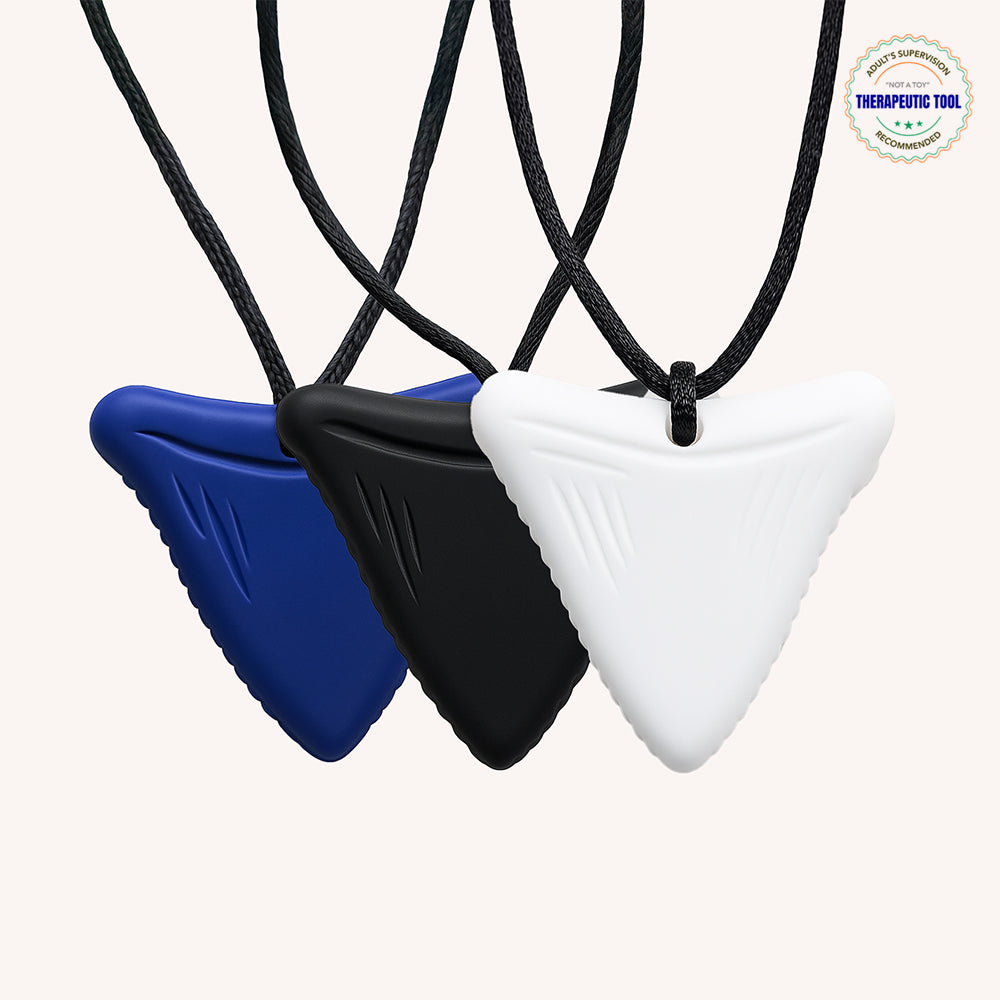 Ableys chewable necklace for sensory needs in blue black and white triangular pendants on black cords