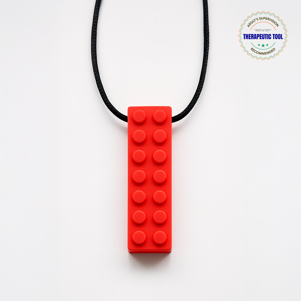 Ableys red silicone building block pendant on black cord chewable necklace for sensory needs durable textured teether