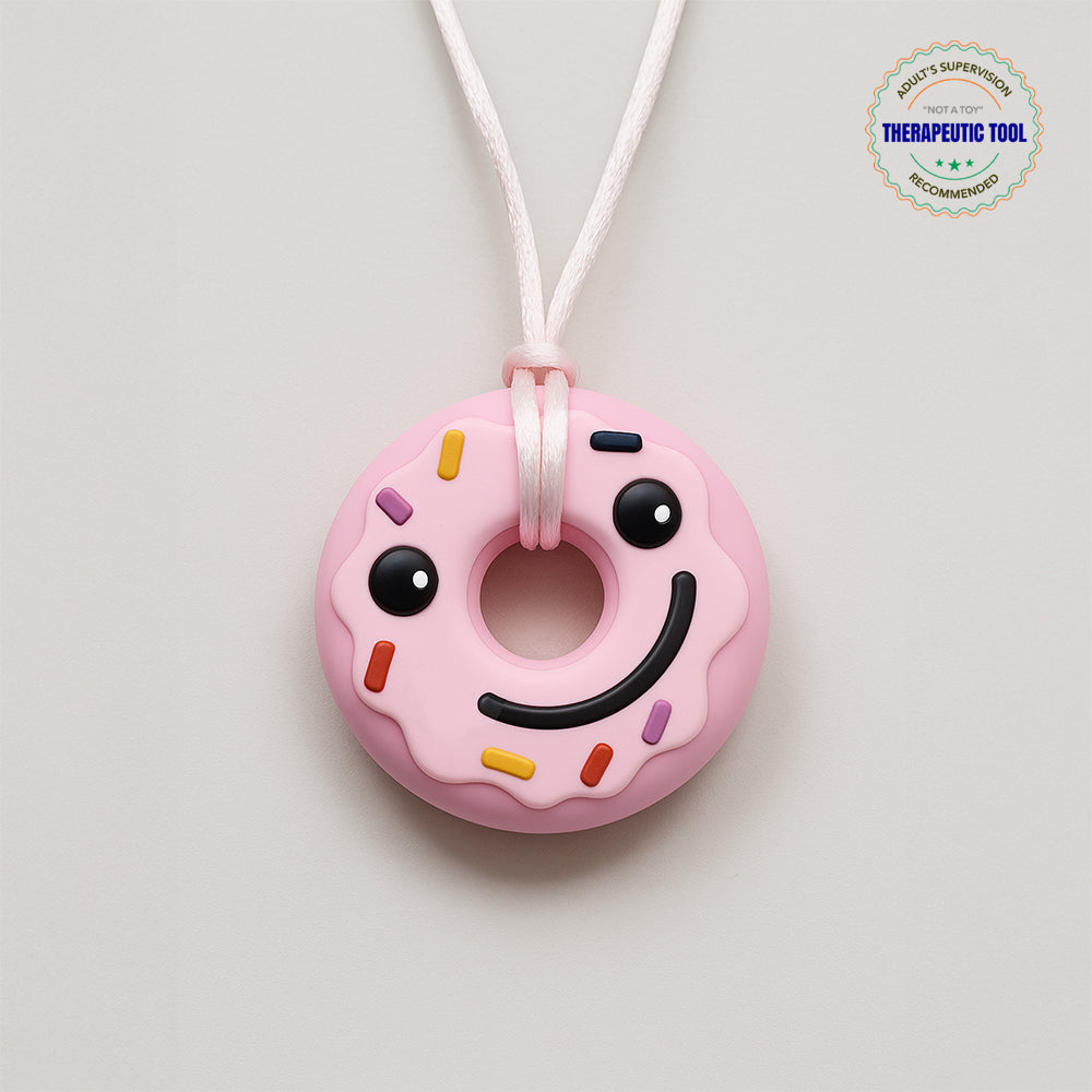 Ableys pink donut silicone pendant chewable necklace for sensory needs wearable teether with smiley face and sprinkles