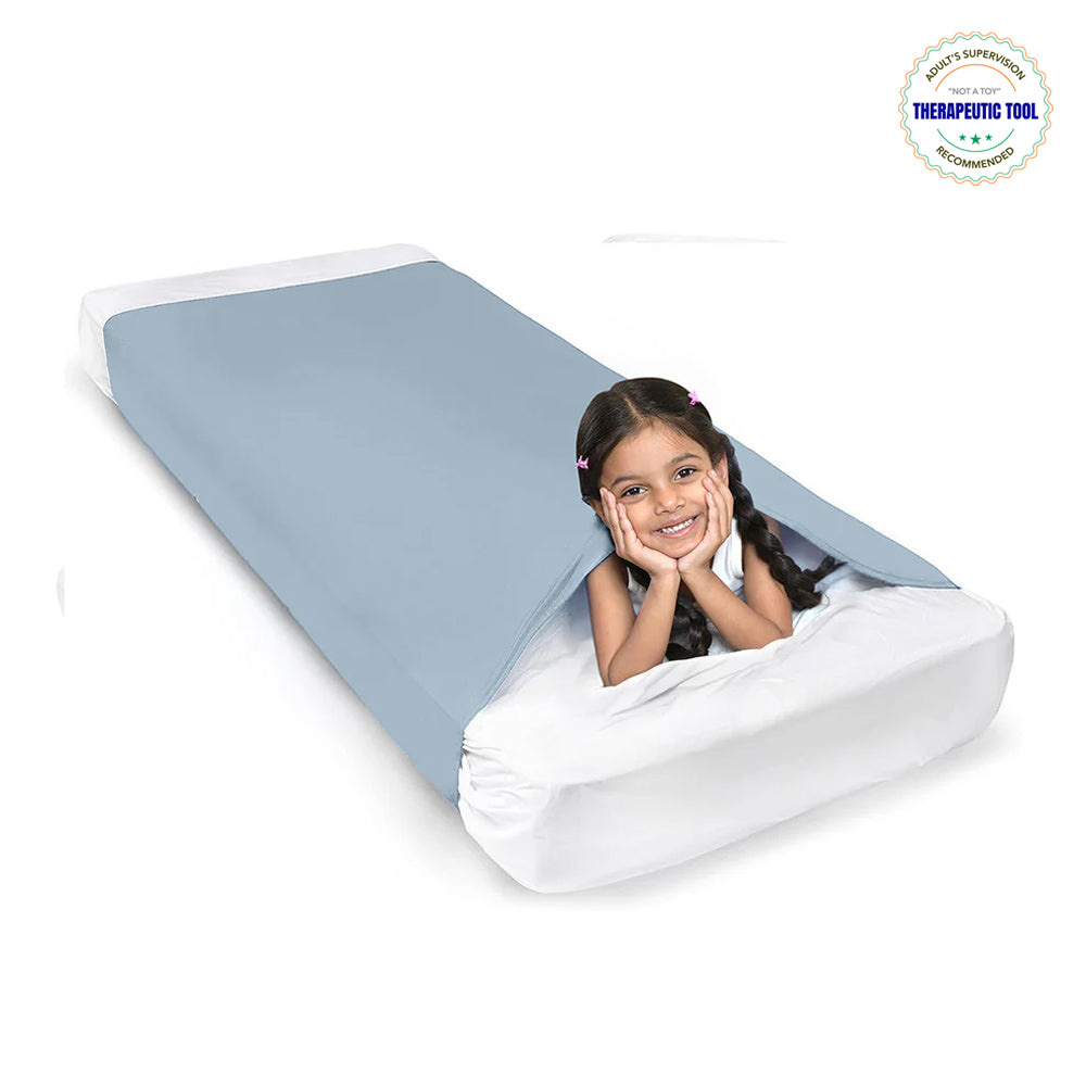 Ableys compression bed sheet for sensory needs in blue with child tucked in for calming deep pressure