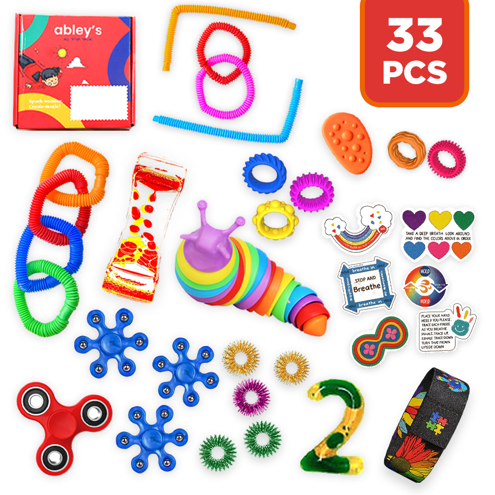 Assorted sensory toys including fidget spinners, stretchy bands, and stress balls with a 'abley's' box and '33 PCS' label.
