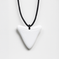 Ableys white triangular silicone chewable necklace for sensory needs on black cord with textured edges