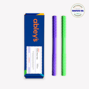 Ableys dual-textured chew tube for sensory needs set with purple and green textured oral tubes and branded box