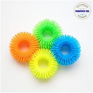Ableys fuzzy sensory bracelets for kids set of four spiky tactile rings in orange yellow green and blue for fidgeting