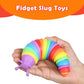 Ableys rainbow slug fidget toy held in hand showing colorful segmented silicone sensory squeeze toy