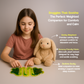 Ableys weighted vibrating plush bunny beige sensory stuffed rabbit beside girl using green fidget pads for calming