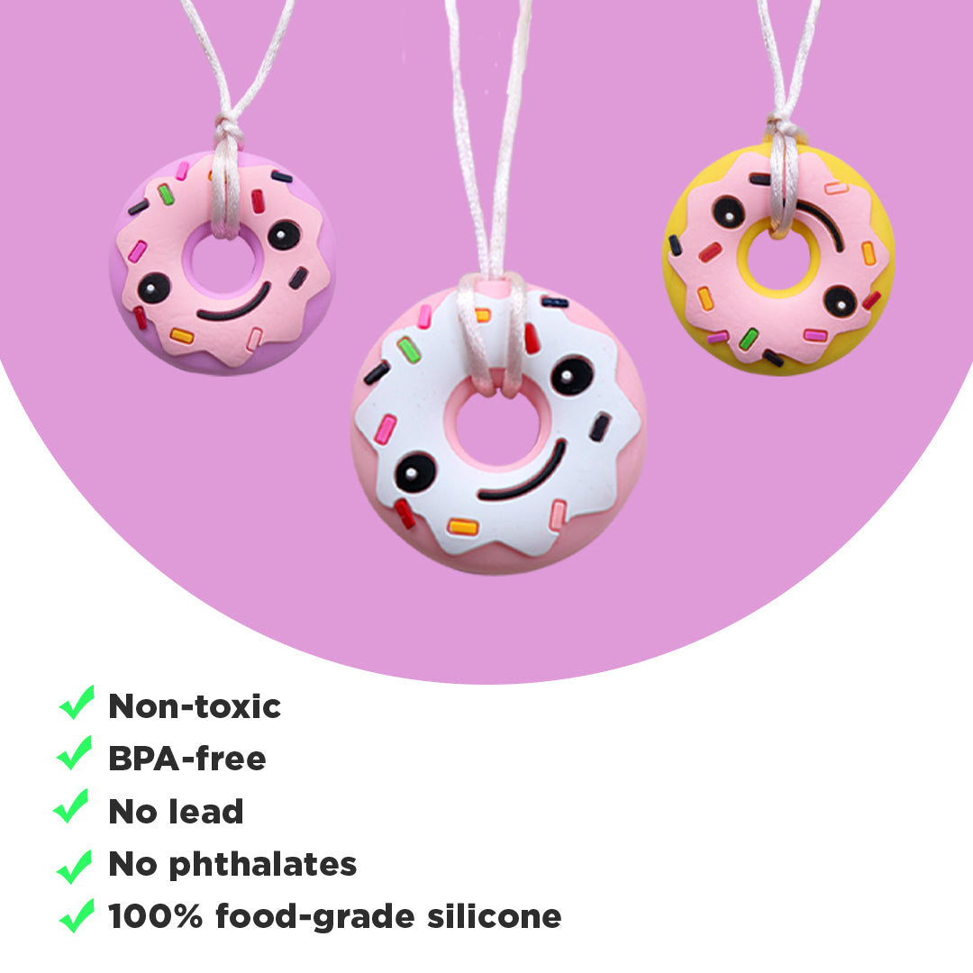 Ableys donut silicone chewable necklace for sensory needs in pink white and yellow with sprinkles on cords