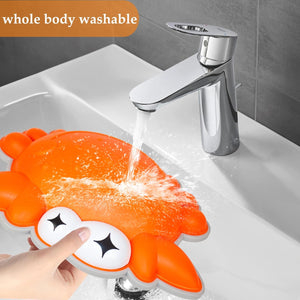 Ableys orange crab toy being washed in sink held under faucet sensory stepping stones for kids