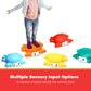 Child stepping on colorful crab shaped sensory stepping stones for kids for balance and sensory play in bright colors