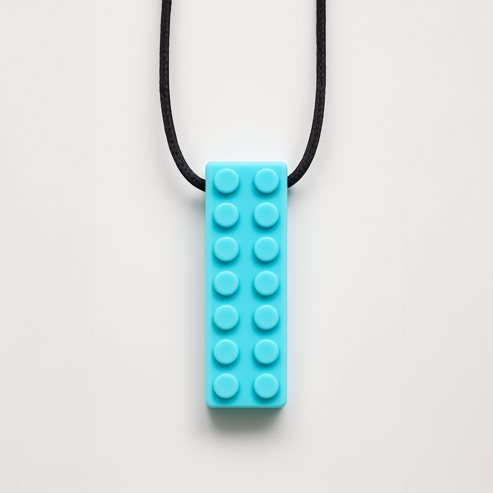 Ableys turquoise silicone building block pendant on black cord chewable necklace for sensory needs