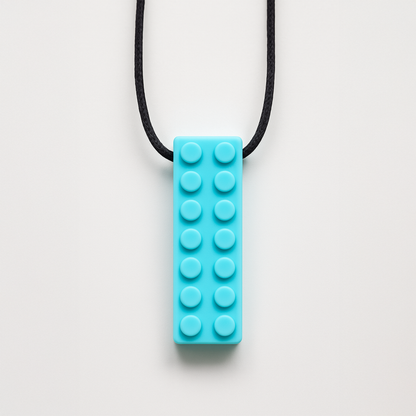 Ableys turquoise silicone building block pendant on black cord chewable necklace for sensory needs