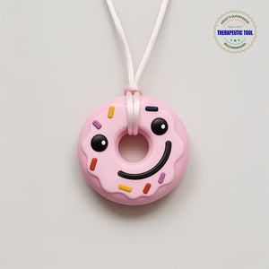 Ableys pink donut silicone pendant chewable necklace for sensory needs wearable teether with smiley face and sprinkles