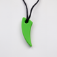 Green silicone fang pendant on black cord sensory saber tooth chew necklace for kids teething aid