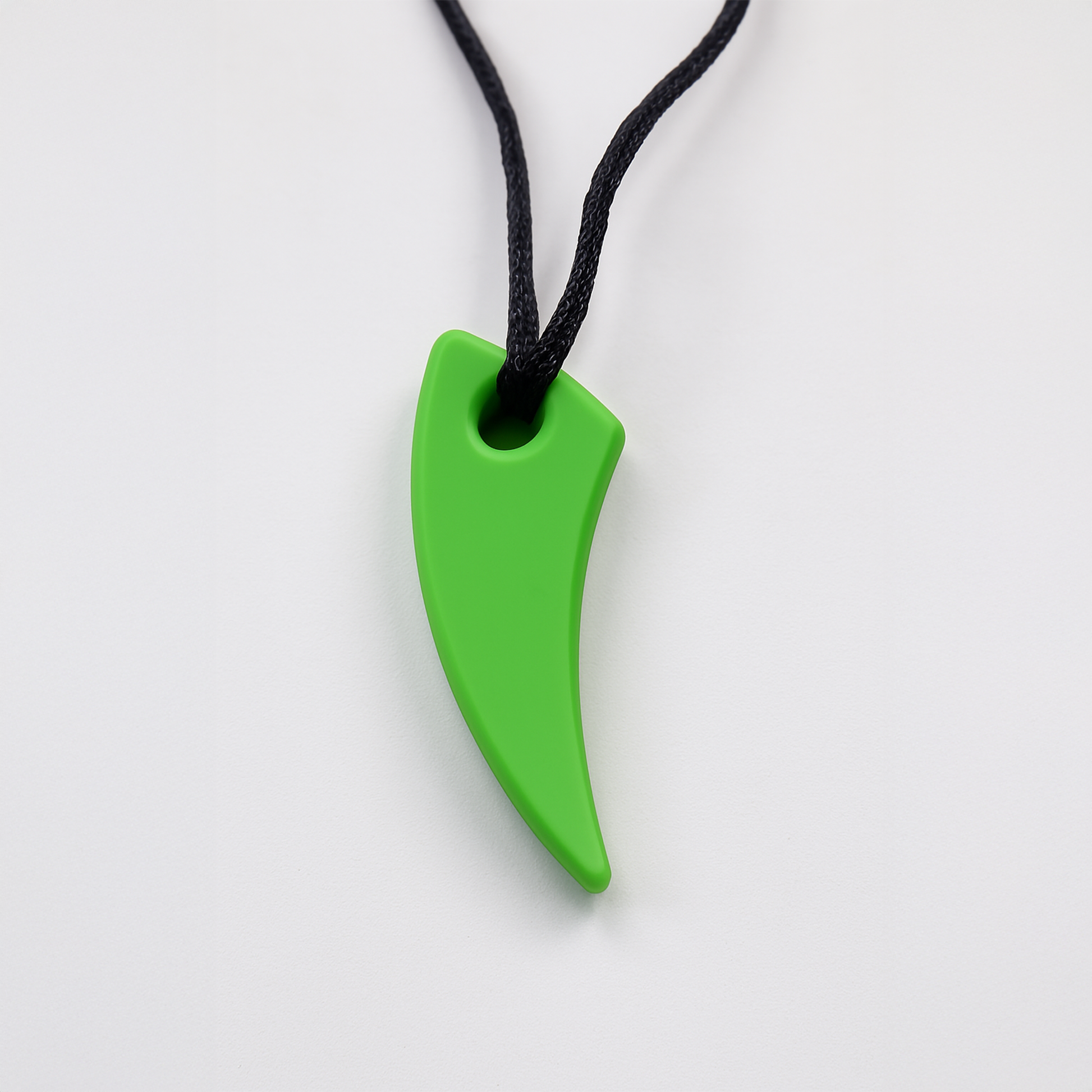 Green silicone fang pendant on black cord sensory saber tooth chew necklace for kids teething aid