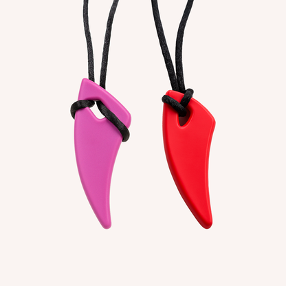 Ableys chewable necklace for sensory needs two silicone fang pendants in pink and red on black cord